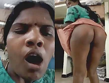Sexy Tamil aunty gives a sensual expression while fingering herself